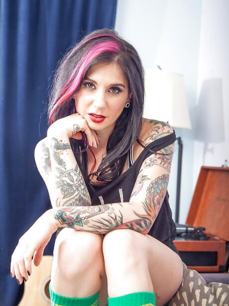 Sexy american milf Joanna Angel posing in lingerie on camera